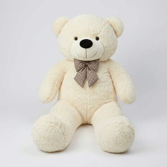 A cream-colored plush teddy bear sitting down, featuring a brown and beige gingham check bow on its neck, set against a plain light gray background.