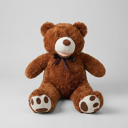 A brown plush teddy bear sitting against a light gray background. The bear has a cream-colored snout, cream paw pads, and a dark brown bow tie.
