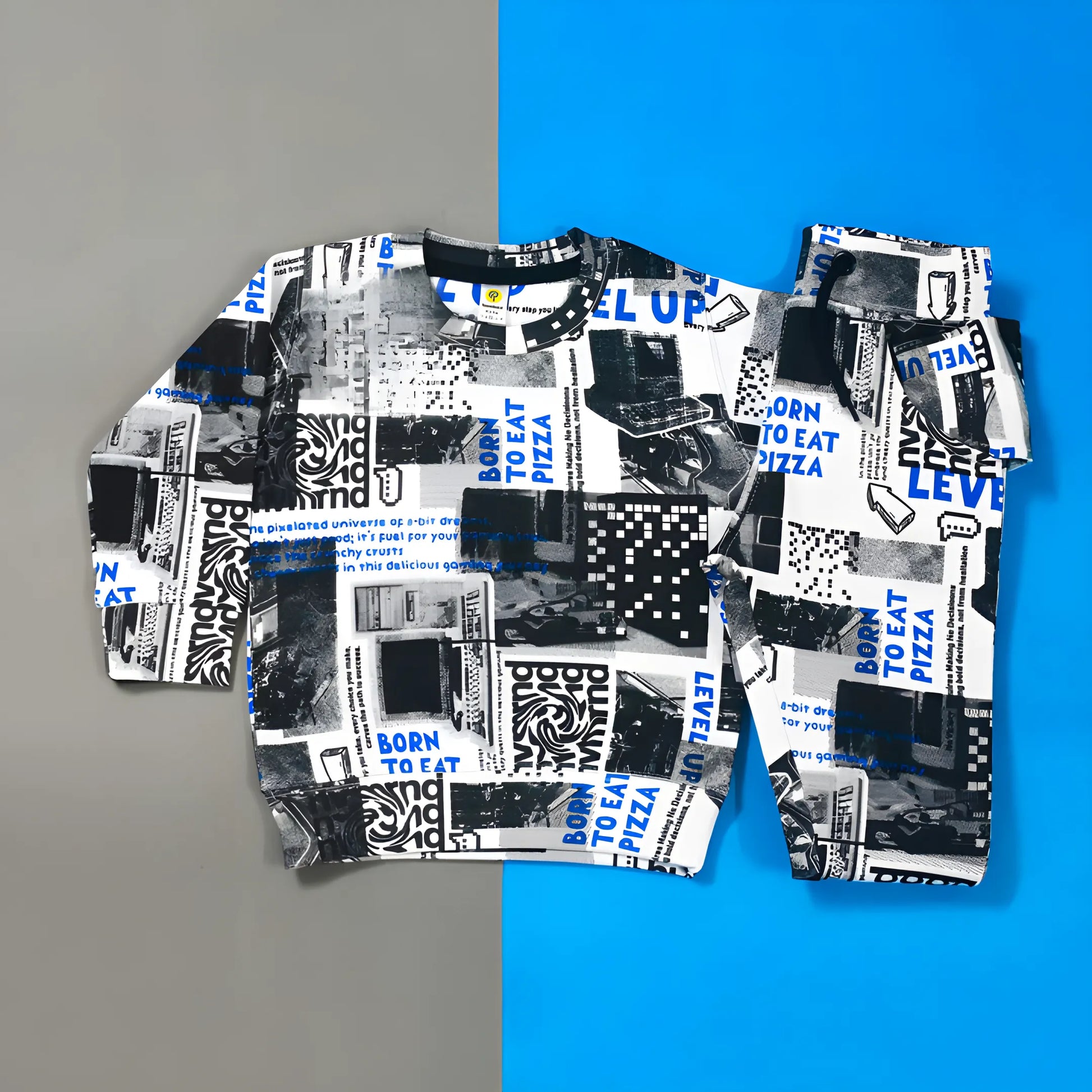 Close‑up of all‑over graphic print on white tracksuit