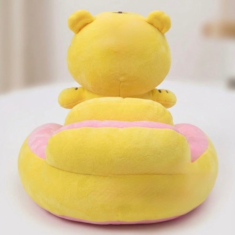 Back view of yellow tiger plush baby seat showing backrest and embroidery