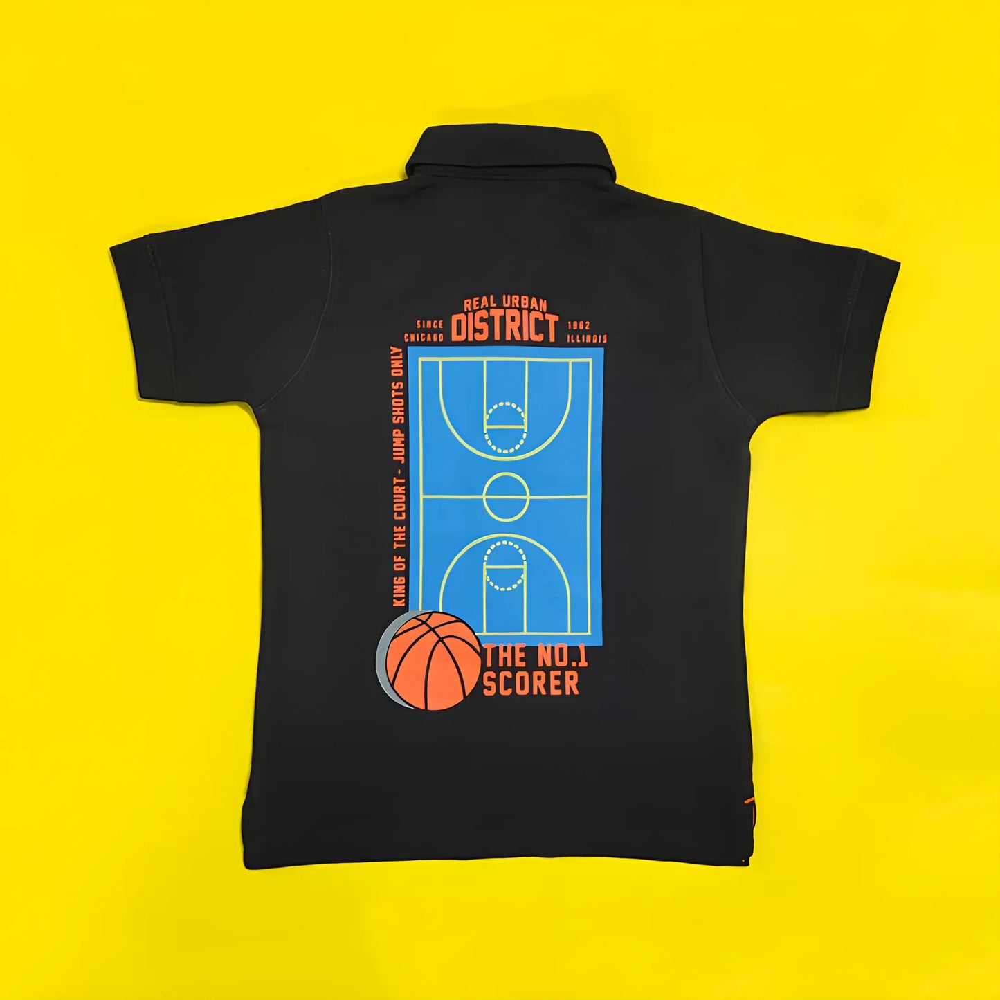 Black polo shirt with basketball design on a yellow background