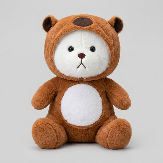 A plush teddy bear toy in a brown hooded outfit with a white face and belly, sitting against a light gray studio background.