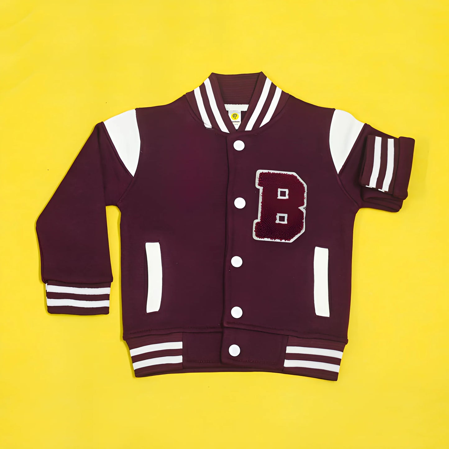 Maroon varsity jacket with white accents on a yellow background