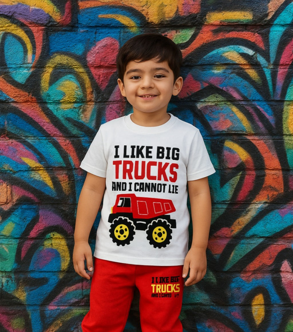 Child wearing a t-shirt with 'I Like Big Trucks' design in front of a colorful graffiti wall.