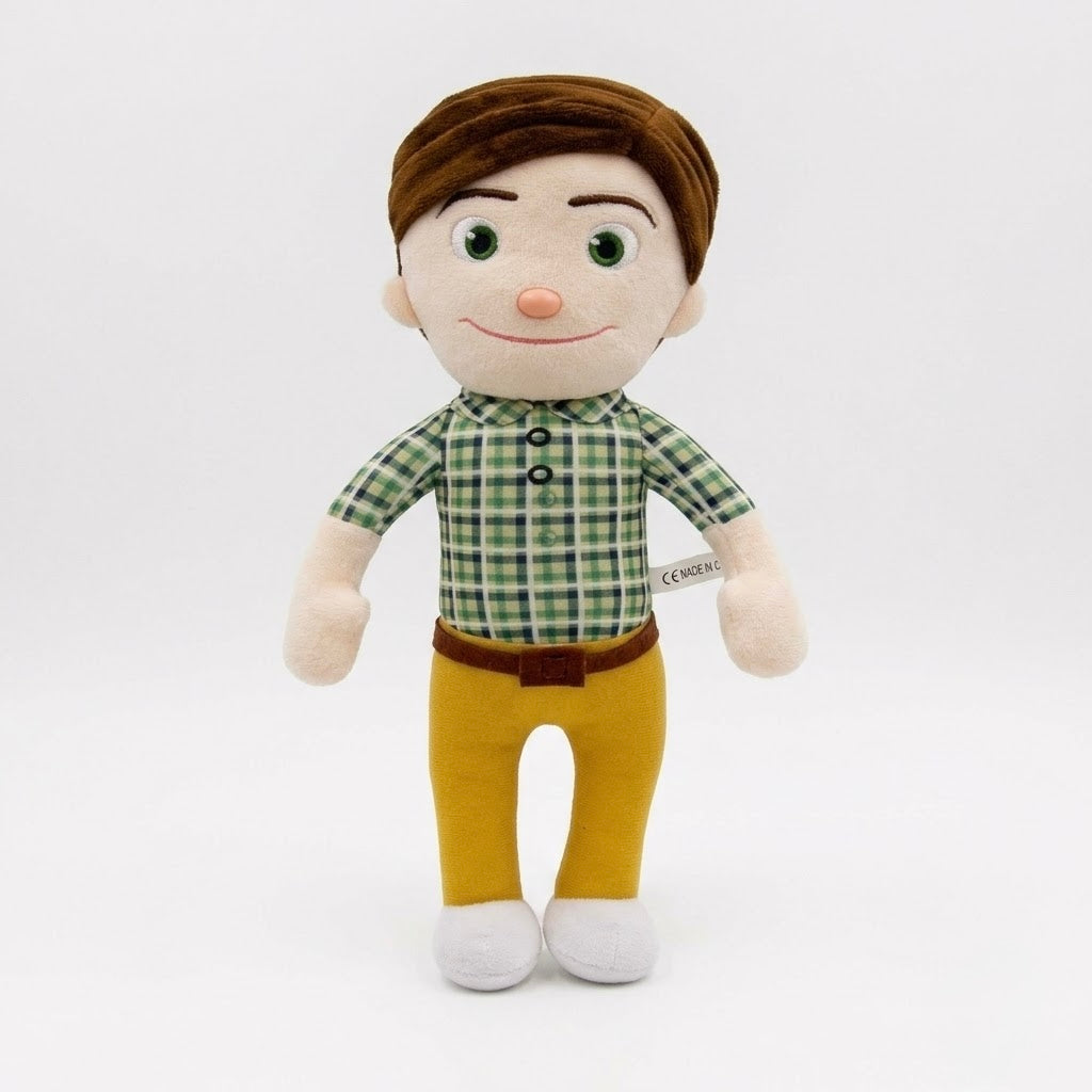 A plush doll of a young boy with brown hair, wearing a green and white plaid shirt, yellow pants, and white shoes, standing against a plain white background.