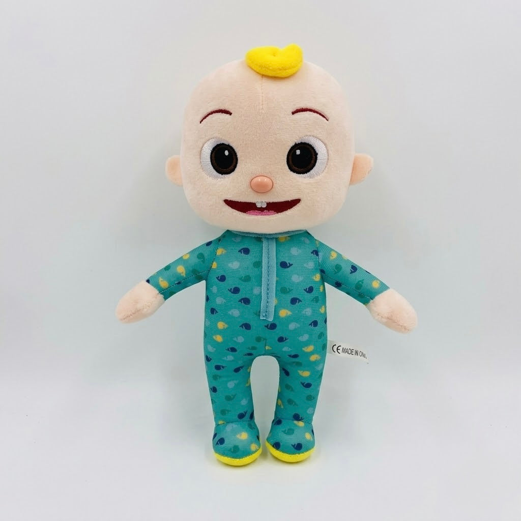 A Cocomice plush toy doll wearing a teal blue and yellow patterned footie pajama, standing against a plain white background.