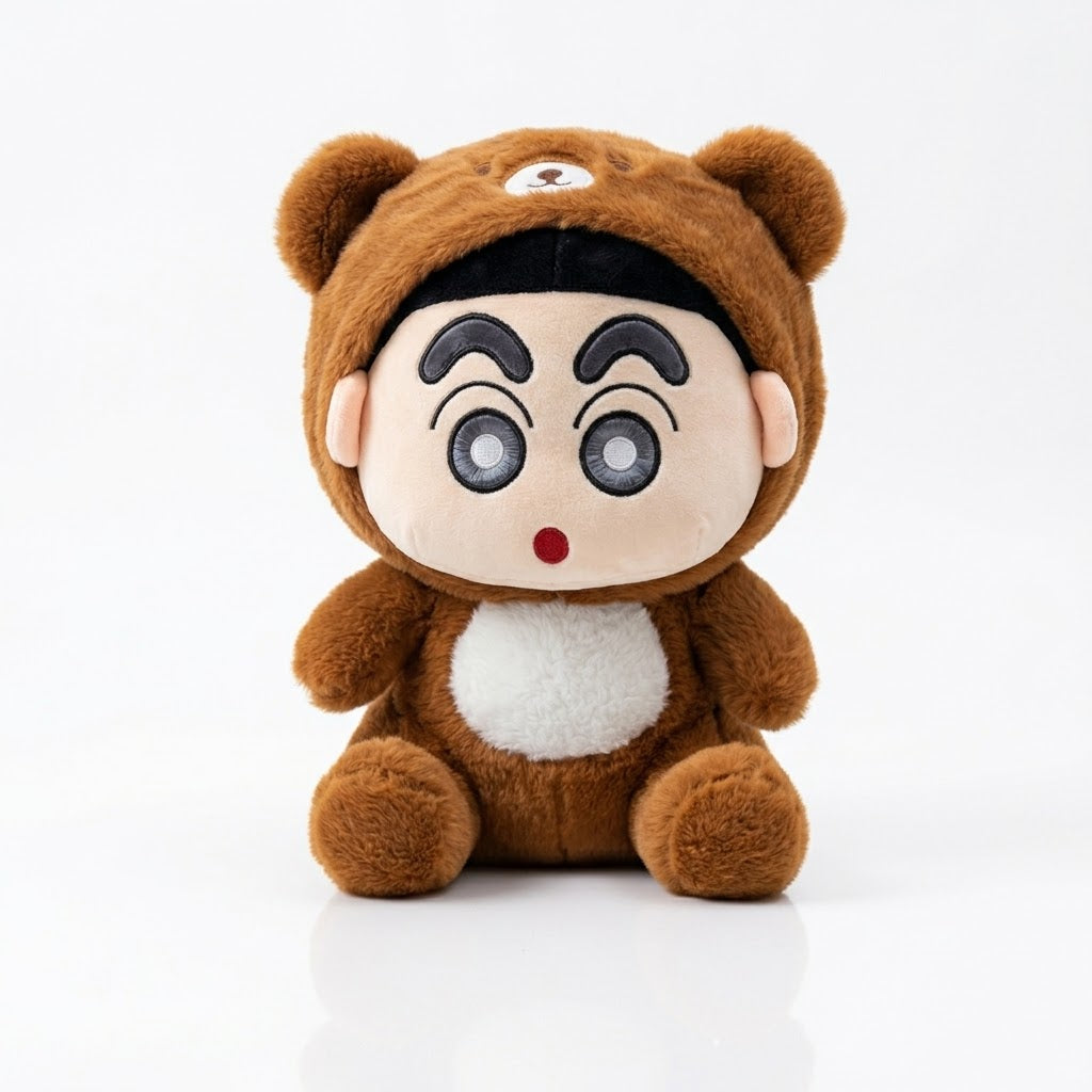 A plush toy doll dressed in a brown bear costume, featuring a round beige face with large cartoon eyes, a small red nose, and a white belly patch, photographed on a clean white background.