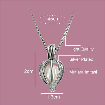 Silver-plated necklace with measurements on a pink background
