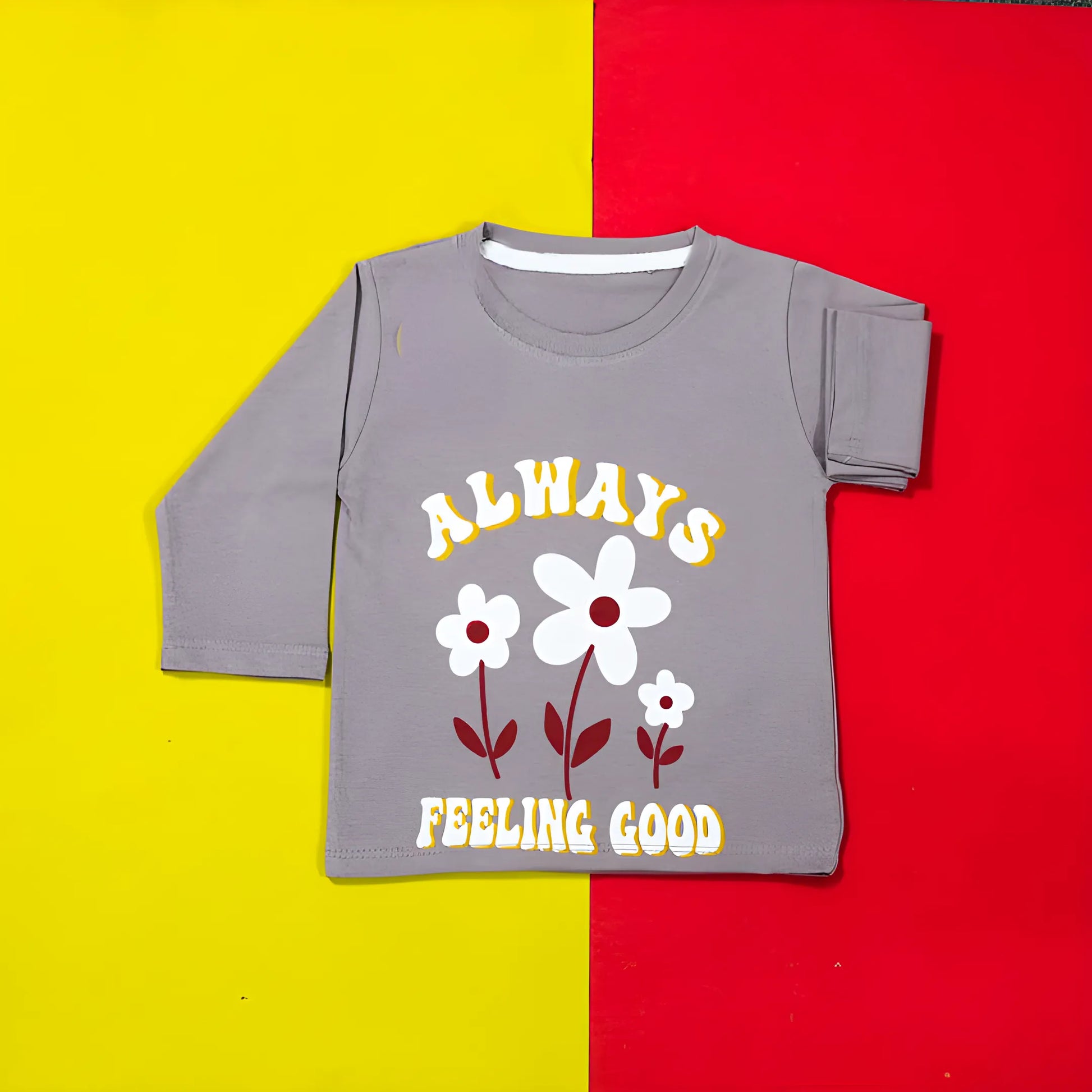 Gray long-sleeve shirt with floral design and text on a yellow and red background