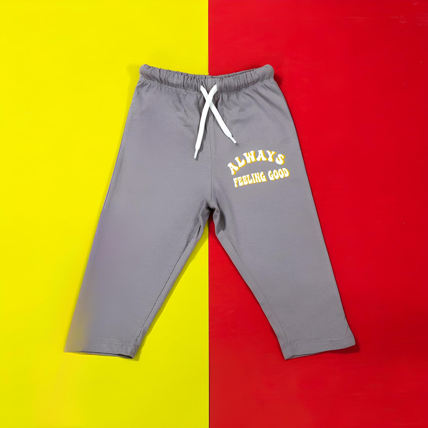 Gray sweatpants with 'Always Feeling Good' text on a yellow and red background