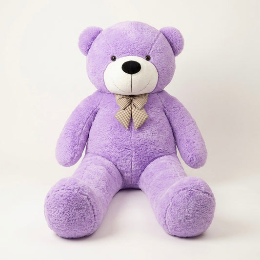 A large purple plush teddy bear sitting down, featuring a white snout, black nose, and a beige checkered bow tie, set against a plain light background.