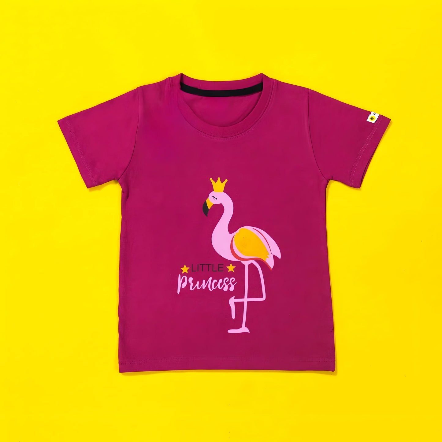 Pink t-shirt with flamingo graphic and 'Little Princess' text on a yellow background