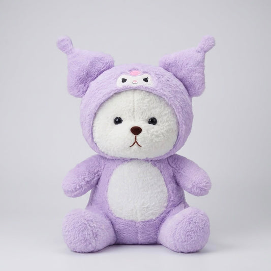A plush toy shaped like a bear wearing a lavender-purple hooded costume, photographed against a plain light gray studio background.