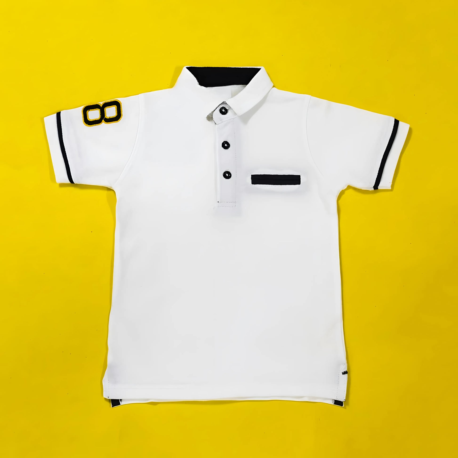 White polo shirt with black accents on a yellow background