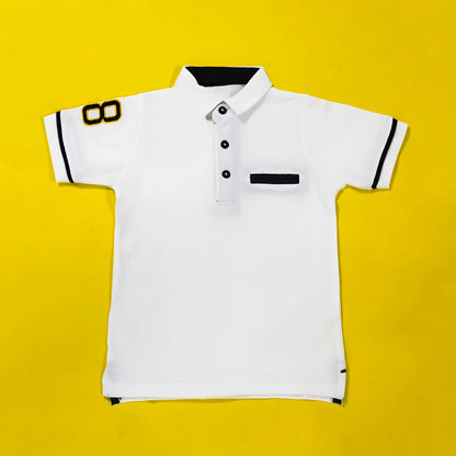 White polo shirt with black accents on a yellow background