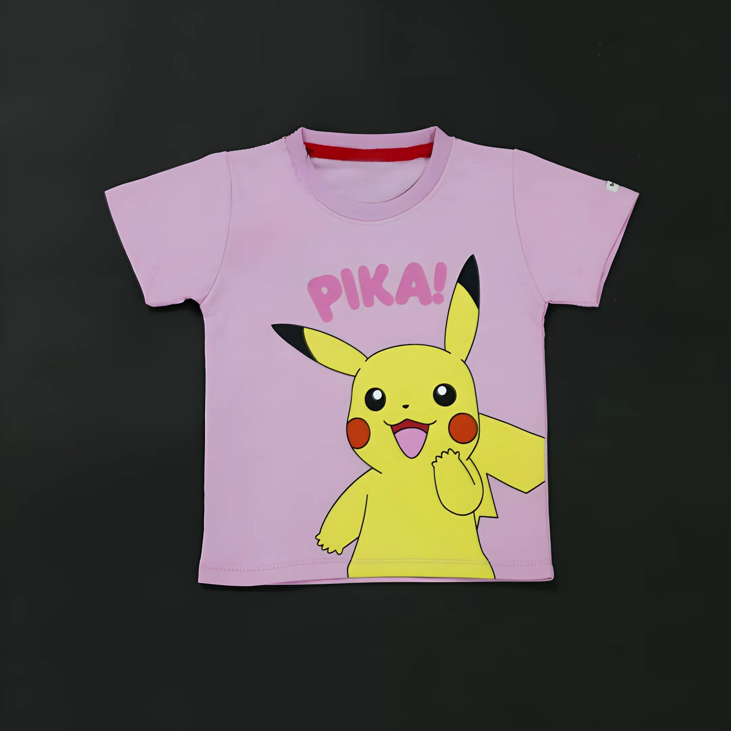 Pink t-shirt with Pikachu and 'PIKA!' text on a black background